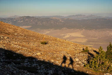 Hiker Shadows on Mountain Ridge in Great Basin national Park