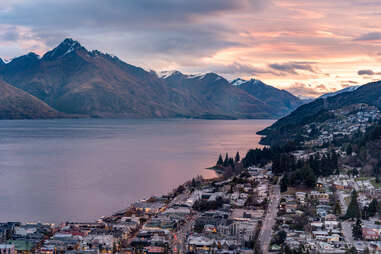 View of Queenstown and Lake Wakatipu at sunset.