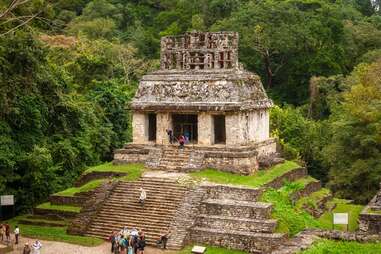 People visiting the Temples of the Cross Group, Mayan ruins at Palenque National Park