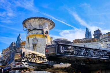 Black Spire Outpost with the Millennium Falcon in the foreground – Star Wars: Galaxy's Edge, Hollywood Studios