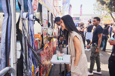 lisa ling ordering at night market stall