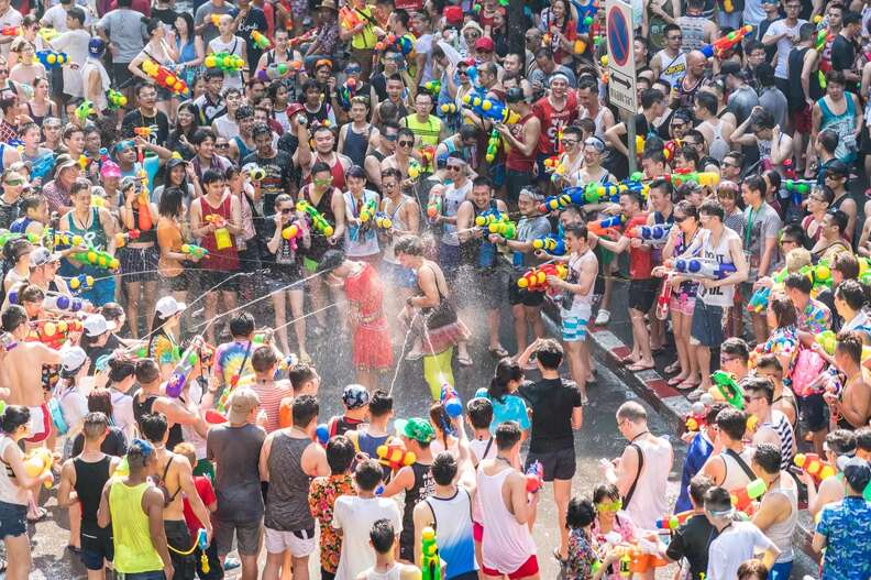 a giant water gun fight in the street