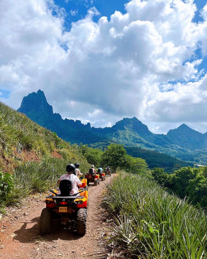 ATVs on a mountain road