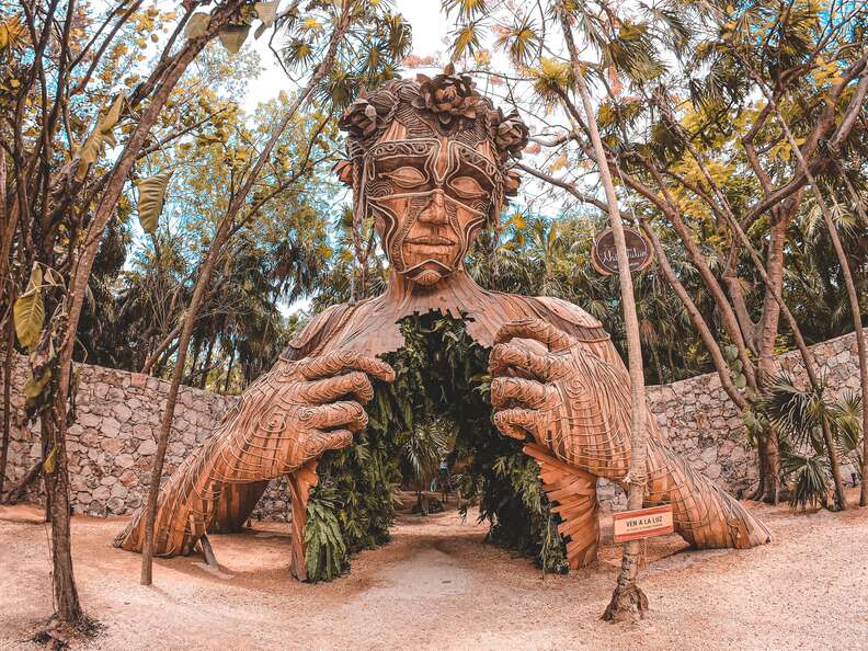 Escape the Touristy Traps with These Adventures in Tulum - Thrillist 2 Giant wooden statue