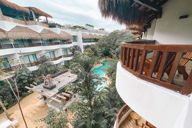 Escape the Touristy Traps with These Adventures in Tulum - Thrillist 11 Bungalows with thatched roofs