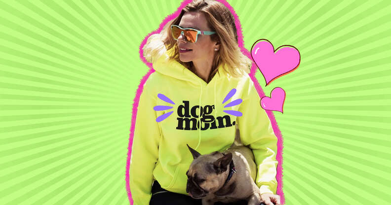 woman wearing dog mom sweatshirt with dog