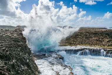Waves crashing on rocks