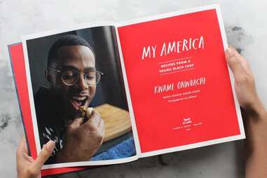 Photo of inside of the My America cookbook by Kwame Onwuachi showing his portrait