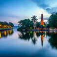 View Of Lake At Tran Quoc Pagoda Against Sky