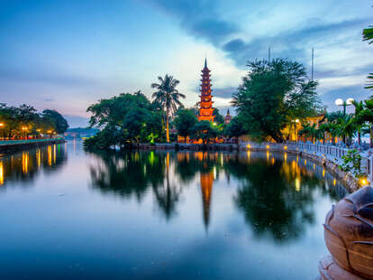 View Of Lake At Tran Quoc Pagoda Against Sky