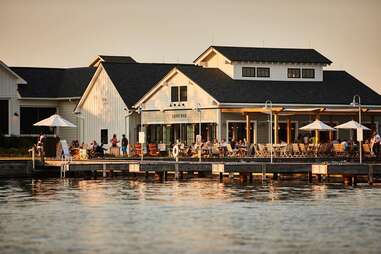 crowds dining outside of the lake house at canadaigua