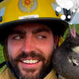 firefighter with magpie on his shoulder