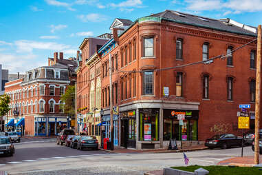 Corner of Fore & Market Sts. of Historical Old Port, a district of Portland, Maine, known for its cobblestone streets, 19th century brick buildings and fishing piers