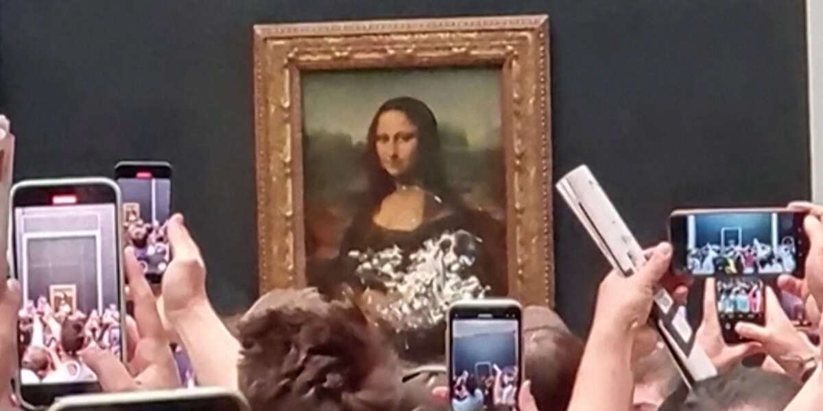 Watch: Eco-activist Throws Cake At Mona Lisa - Nowthis