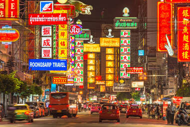 Yaowarat road lit up with neon signs at night