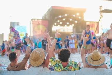 friends enjoying hangout music festival in gulf shores, alabama