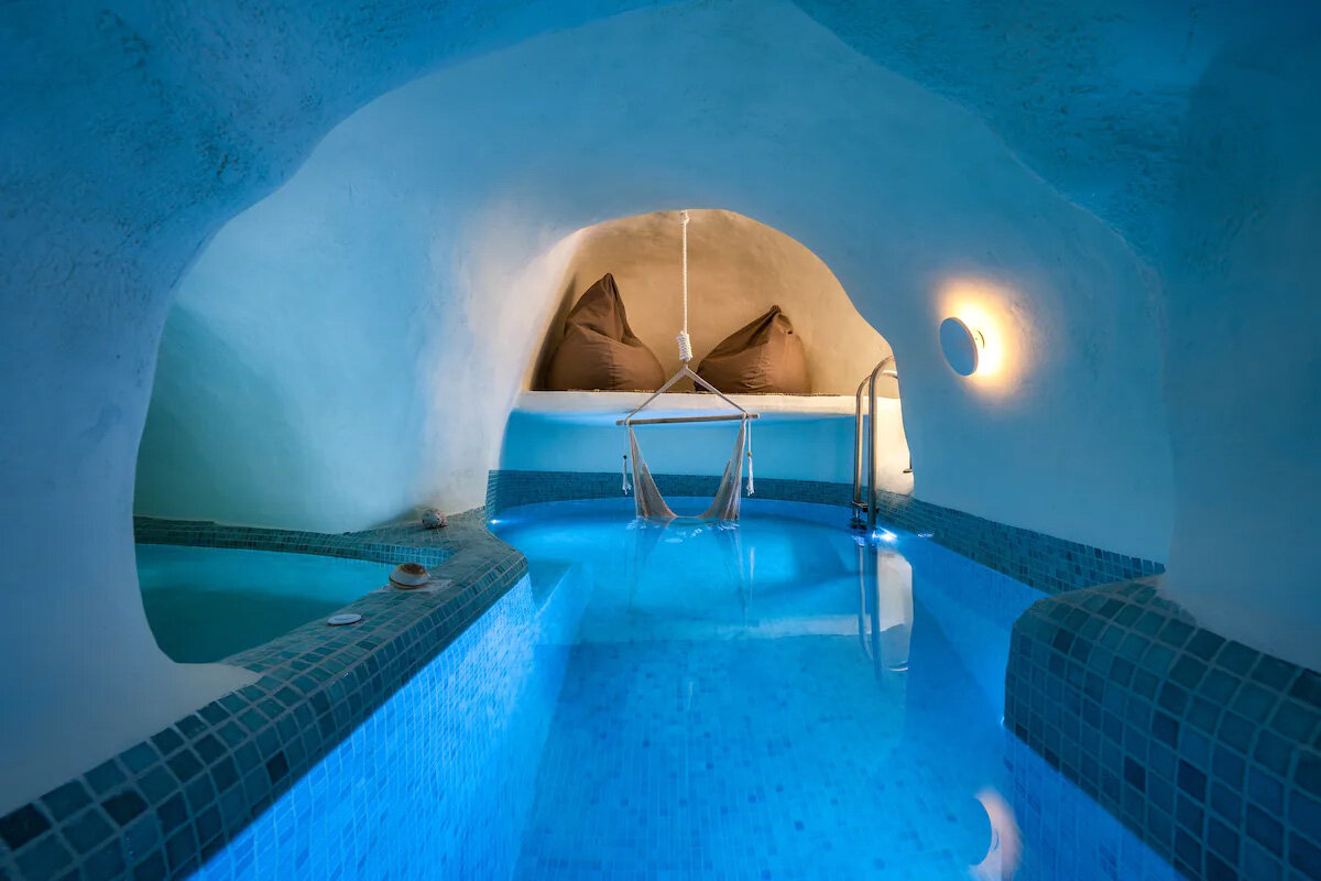 This Cave Home in Greece Has a Luxury Heated Pool Inside & You Can Rent It on Airbnb