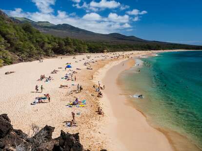 People lounging on beach