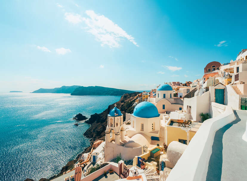 Traditional white buildings facing Mediterranean Sea in Oia