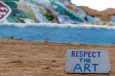 Salvation Mountain and a sign that says Respect the Art