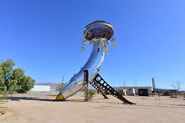 An abstract art plane fuselage at Bombay beach