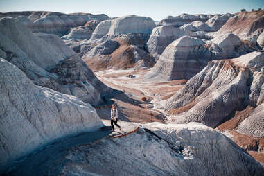 View of woman hiking on mountain