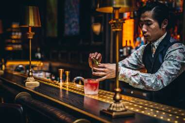 bartender pouring a drink
