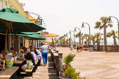 people enjoying boardwalk in myrtle beach, south carolina