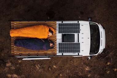 sleeping on top of a camper van