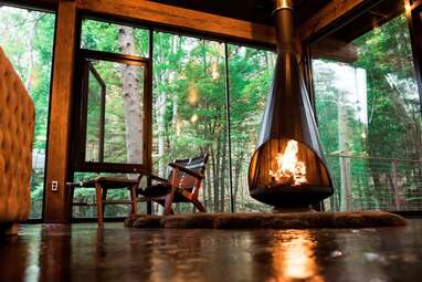 Glass cabin surrounded by waterfalls in Hocking Hills