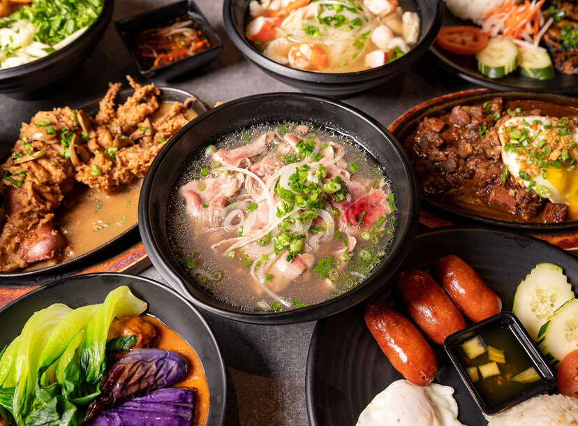 Dim Sum or Chinese dumpling in a stream hot pot of food wheelbarrow on  street food of Bangkok. Many dumpling in a wooden basket is streaming in  old As Stock Photo 