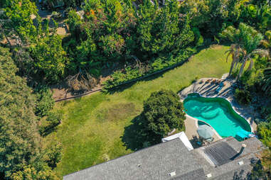 aerial view of swimming pool in backyard