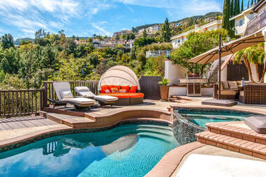 pool with lounge chairs