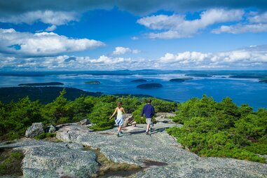people walking on rocks