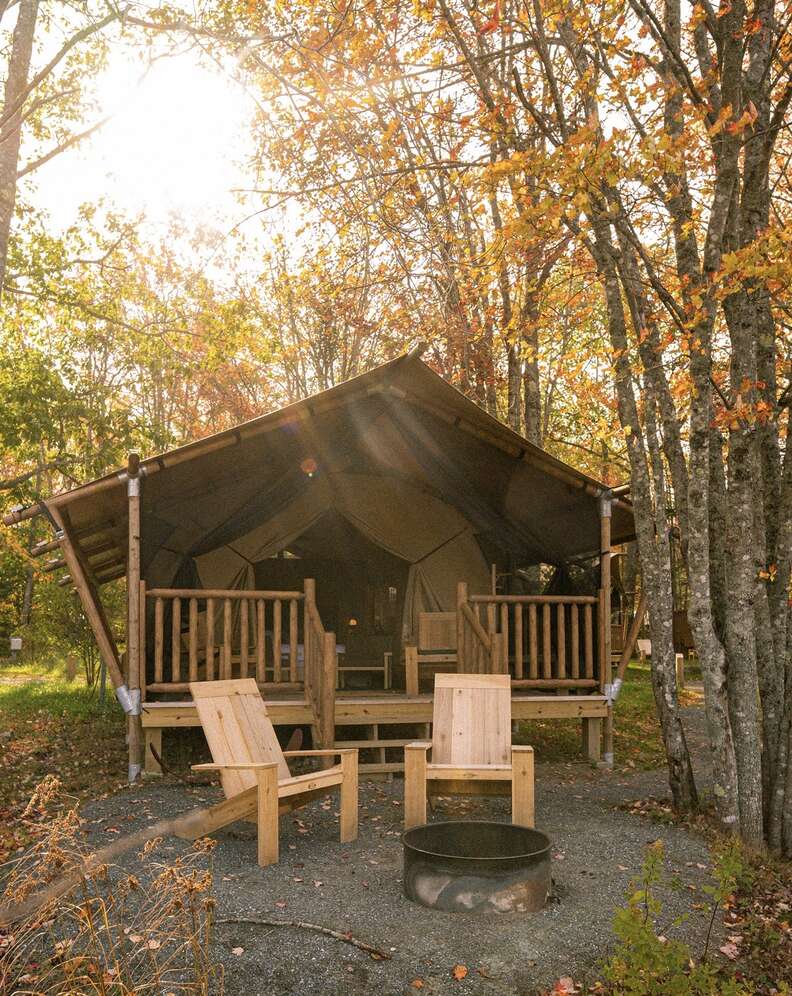fire pit in front of tent cabin