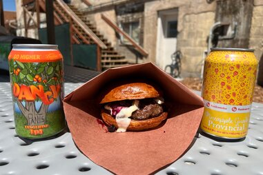 burger and beer cans