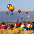 people watching a hot air balloon festival in Nevada