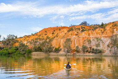 people canoeing on the water