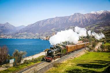 train next to water