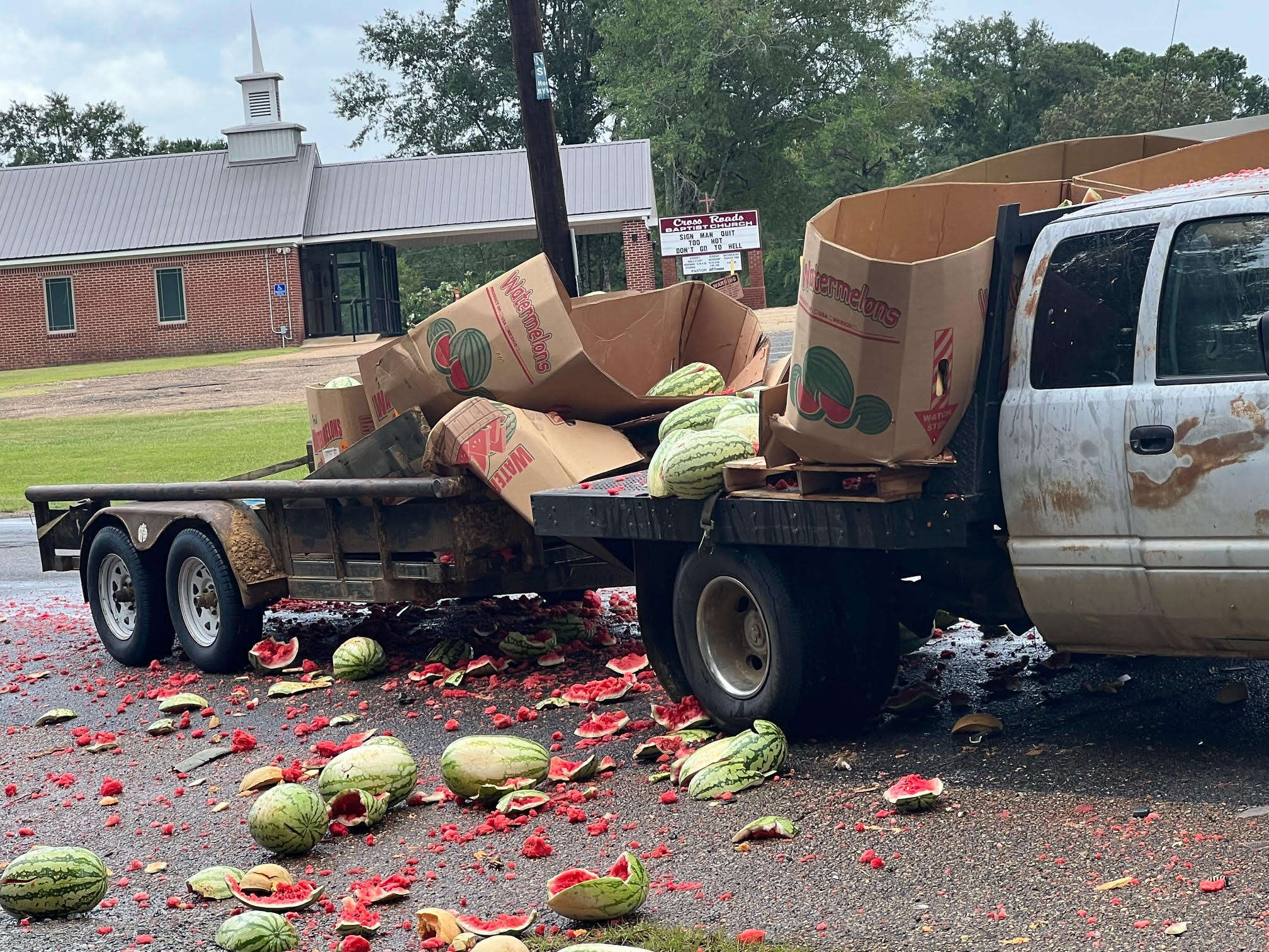 A produce truck after accident that crushed melons.