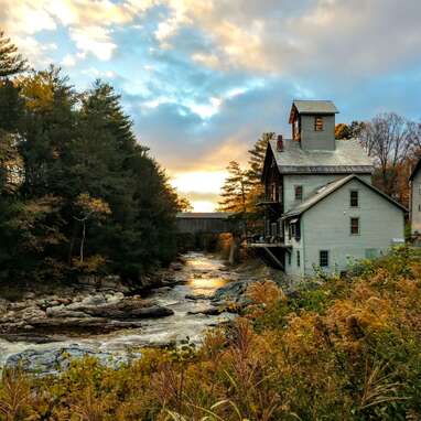 Historic mill perched atop a waterfall