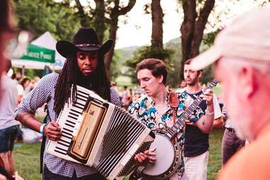 people playing musical instruments in park