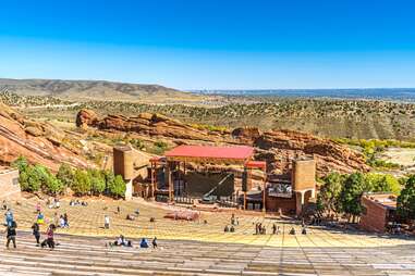 an amphitheater built into the side of a mountain