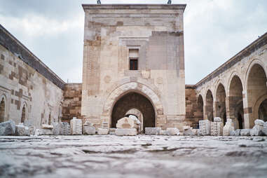 Exterior of historic aged Seljuk caravanserai and courtyard