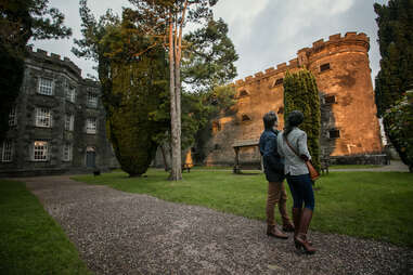 people looking at castle