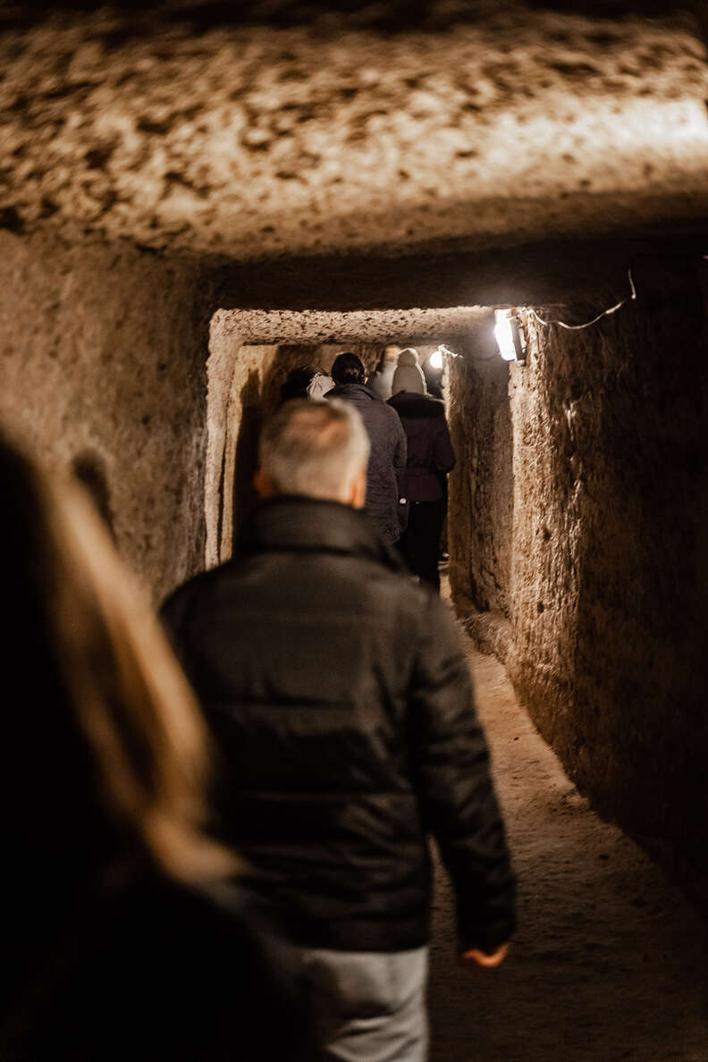 people touring crypt