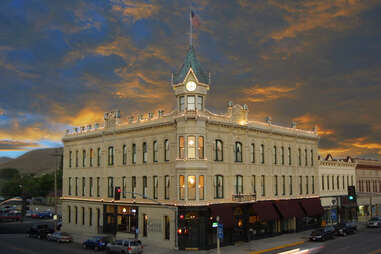 exterior view of geiser grand hotel under cloud cover, baker city, oregon