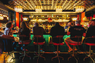 Bar seating at House of the Red Pearl at the Tin Building