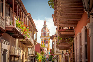 colorful buildings lining a narrow street