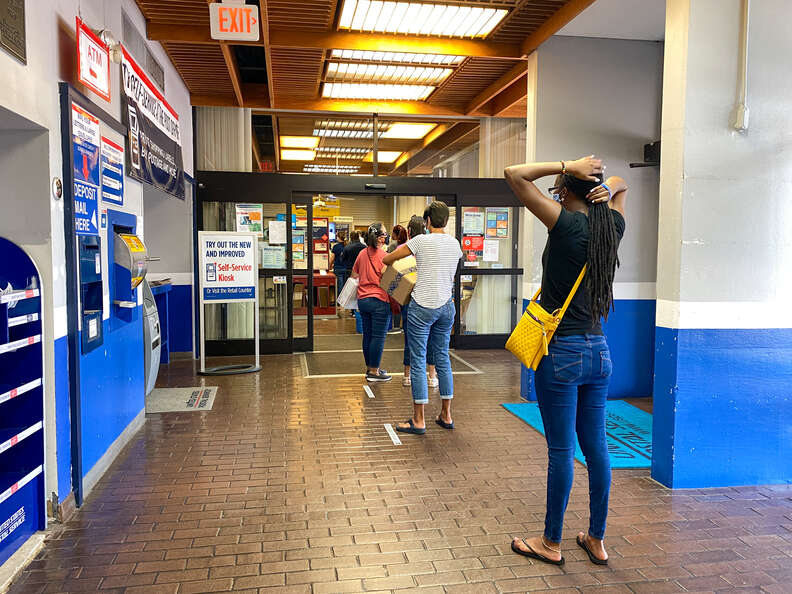 people in line at the post office